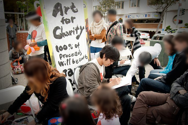 桜祭りの似顔絵チャリティーイベント