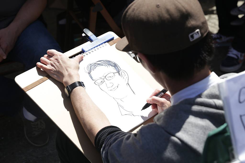 桜祭りの似顔絵チャリティーイベント